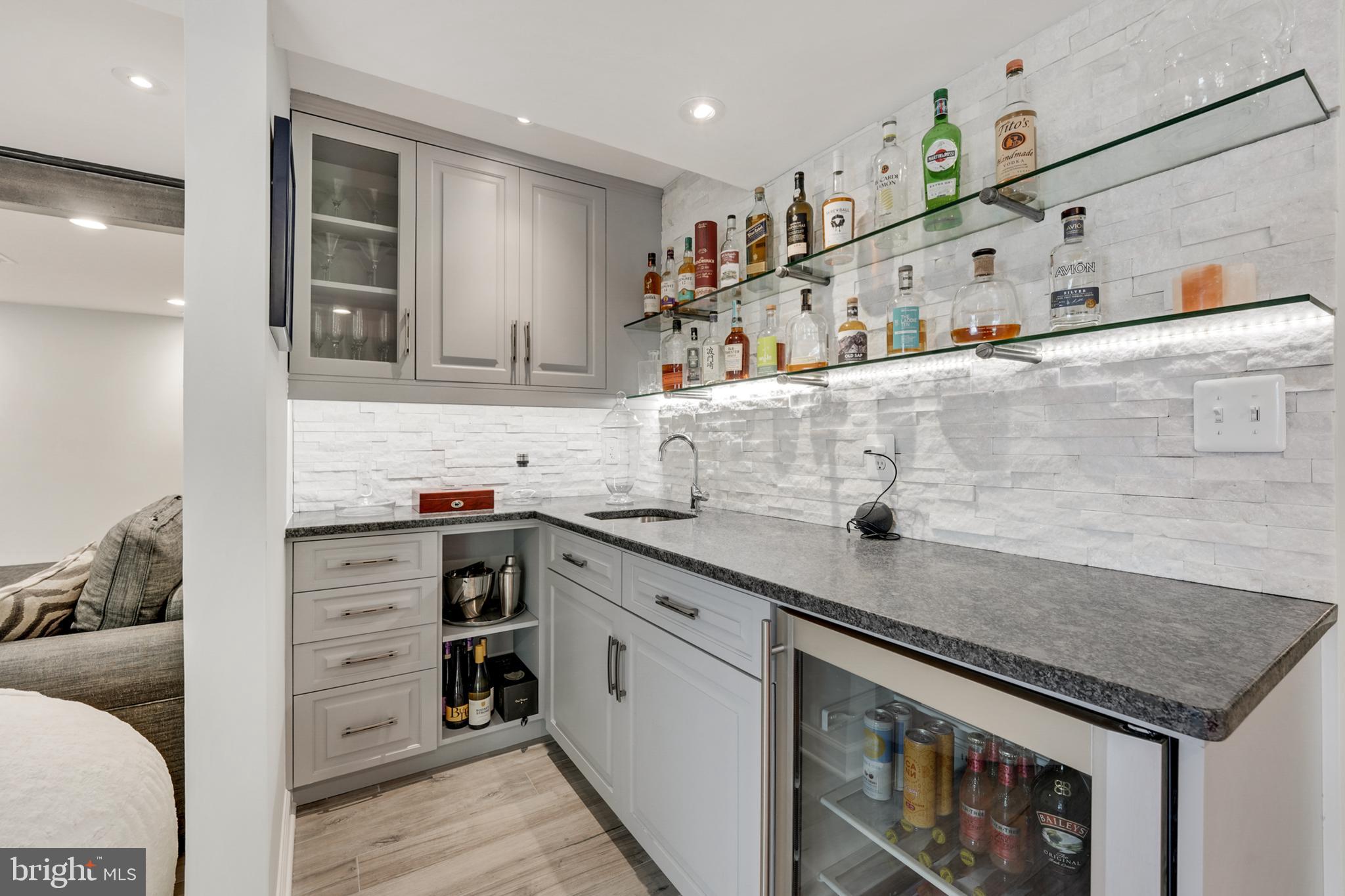 1610 Autumnwood Drive Reston, VA 20194 - Photo 43 of 55 Lower-level wet bar with under cabinet lighting