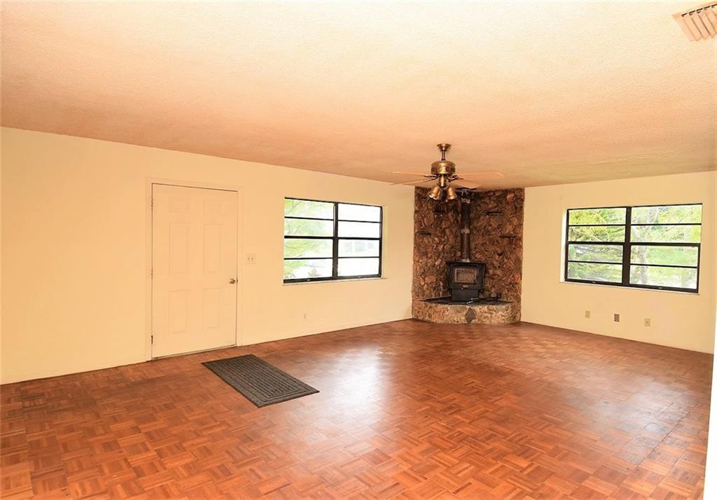 3850 Southeast Middle Street Stuart, FL 34997 - Photo 5 of 11 an empty room with windows