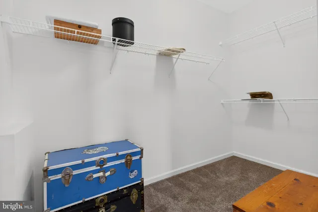 a bathroom with a glass door shower