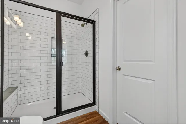 a view of a livingroom with furniture and a window
