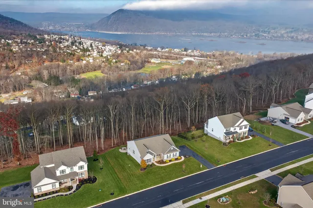 a view of a two chairs in the patio