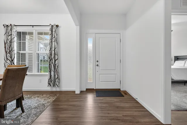 a view of livingroom with furniture and wooden floor