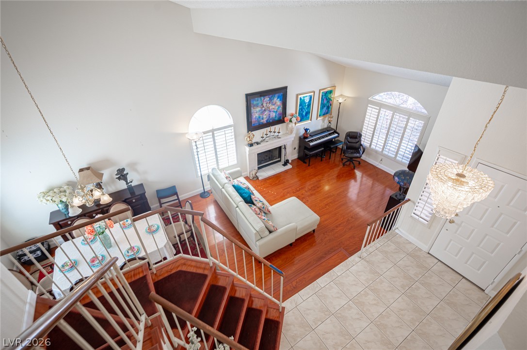 718 Rusty Spur Drive Henderson, NV 89014 - Photo 37 of 50 A spacious, airy living area with soaring ceilings and rich hardwood floors.