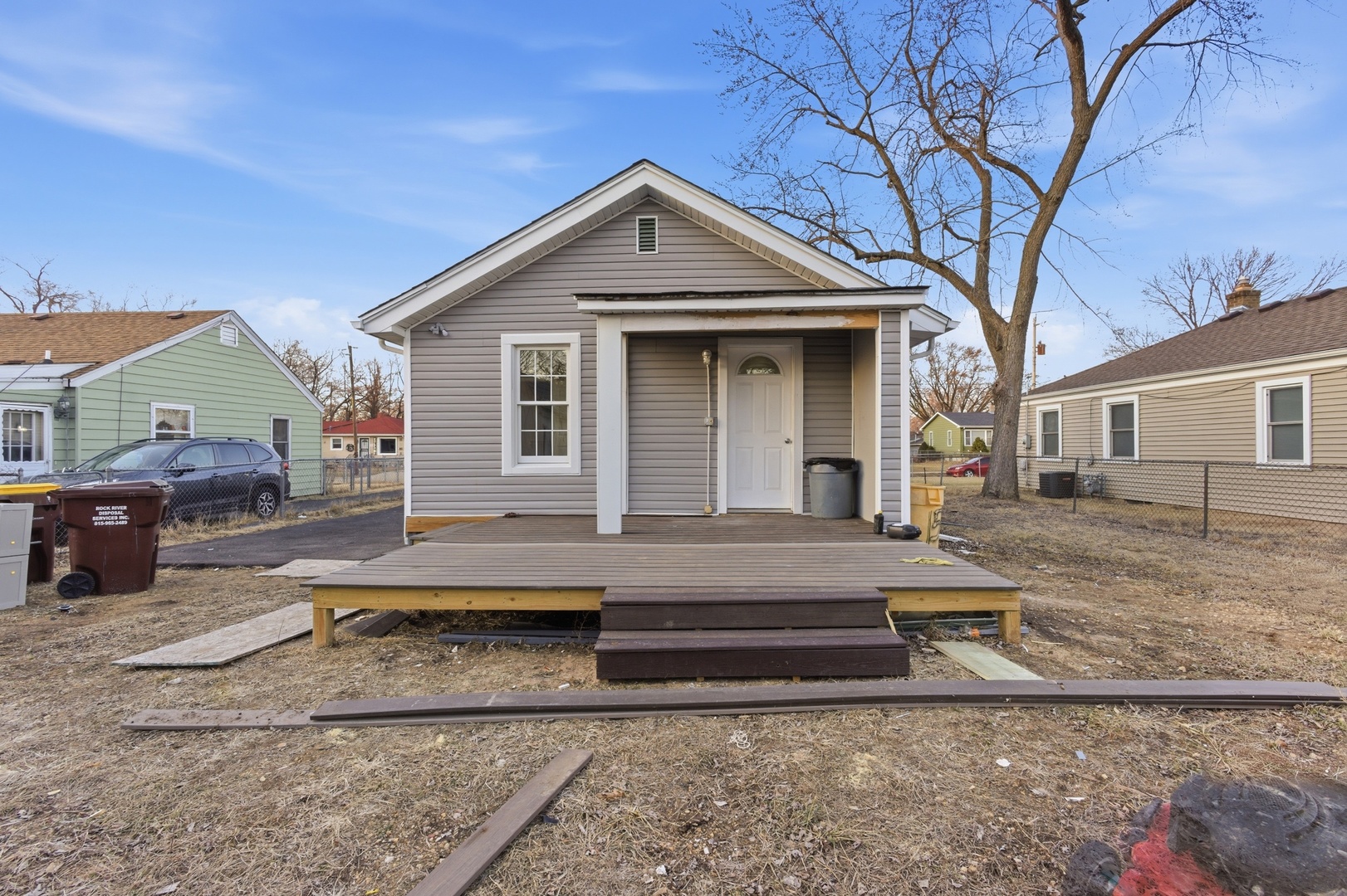 521 Fitch Road Rockford, IL 61109 - Photo 10 of 10 a front view of a house with cars parked