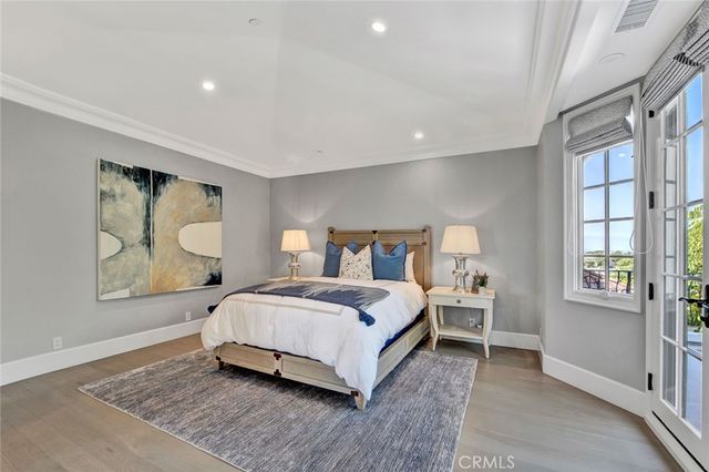 a view of a patio with table and chairs and potted plants