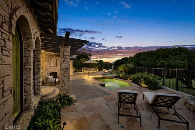 a large bathroom with a glass door shower and sink