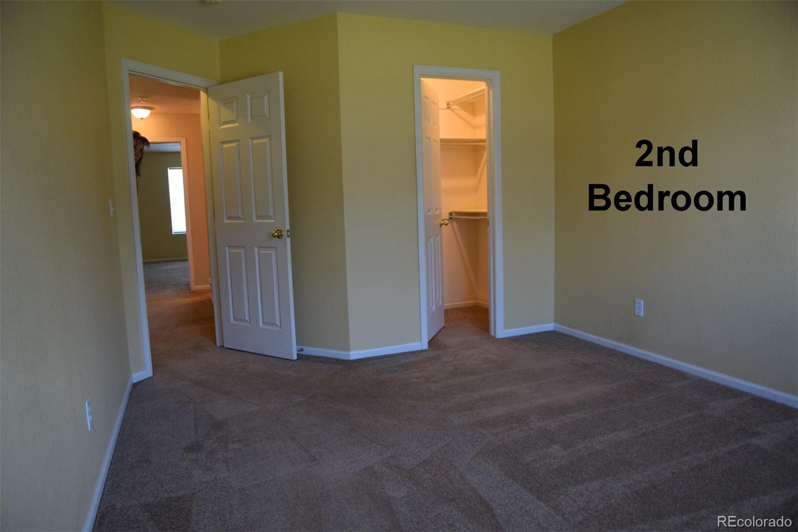 8237 West 54th Avenue, Unit 2 Arvada, CO 80002 - Photo 13 of 20 a view of a room with an empty space