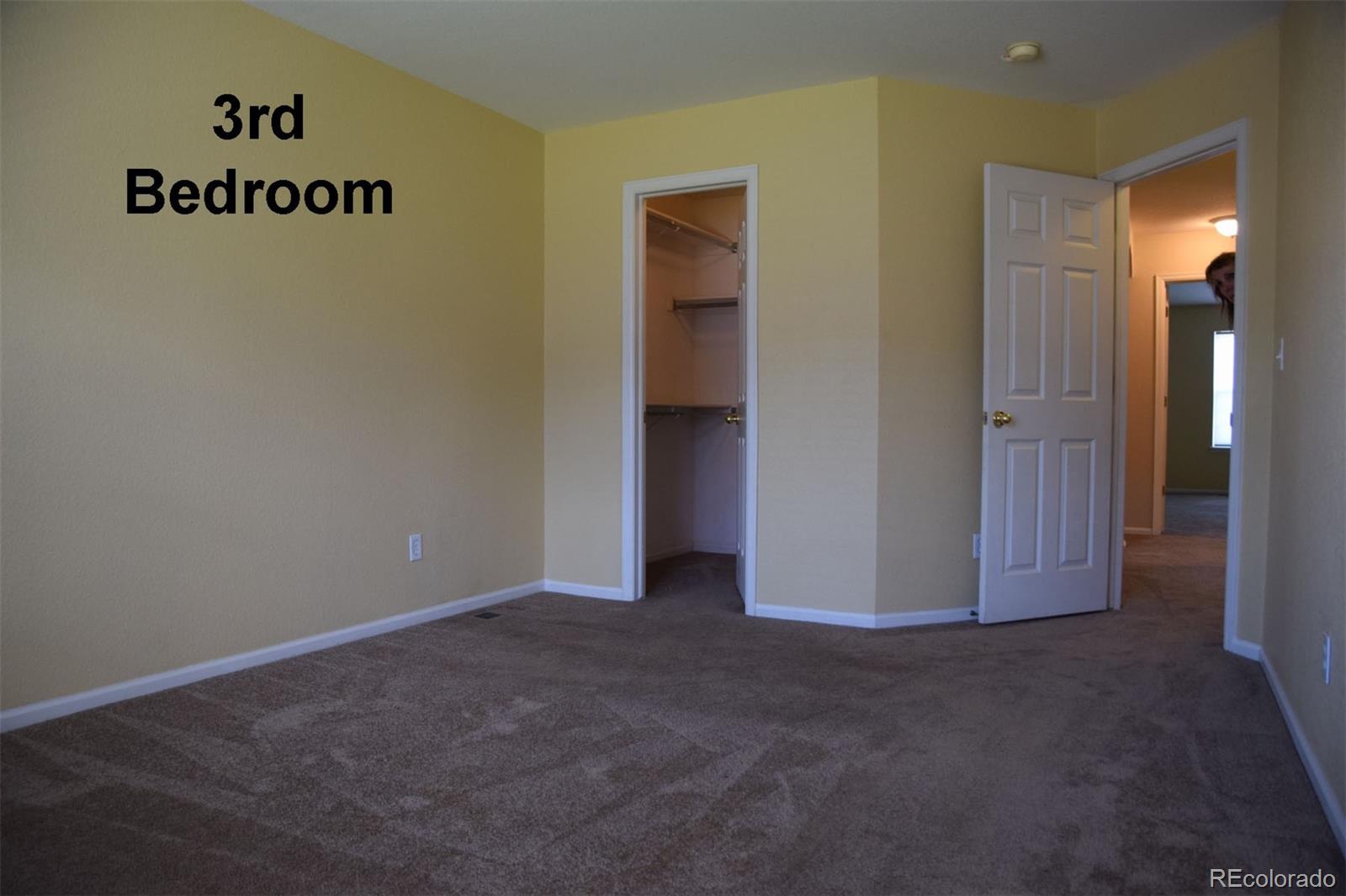 8237 West 54th Avenue, Unit 2 Arvada, CO 80002 - Photo 14 of 20 a view of an empty room