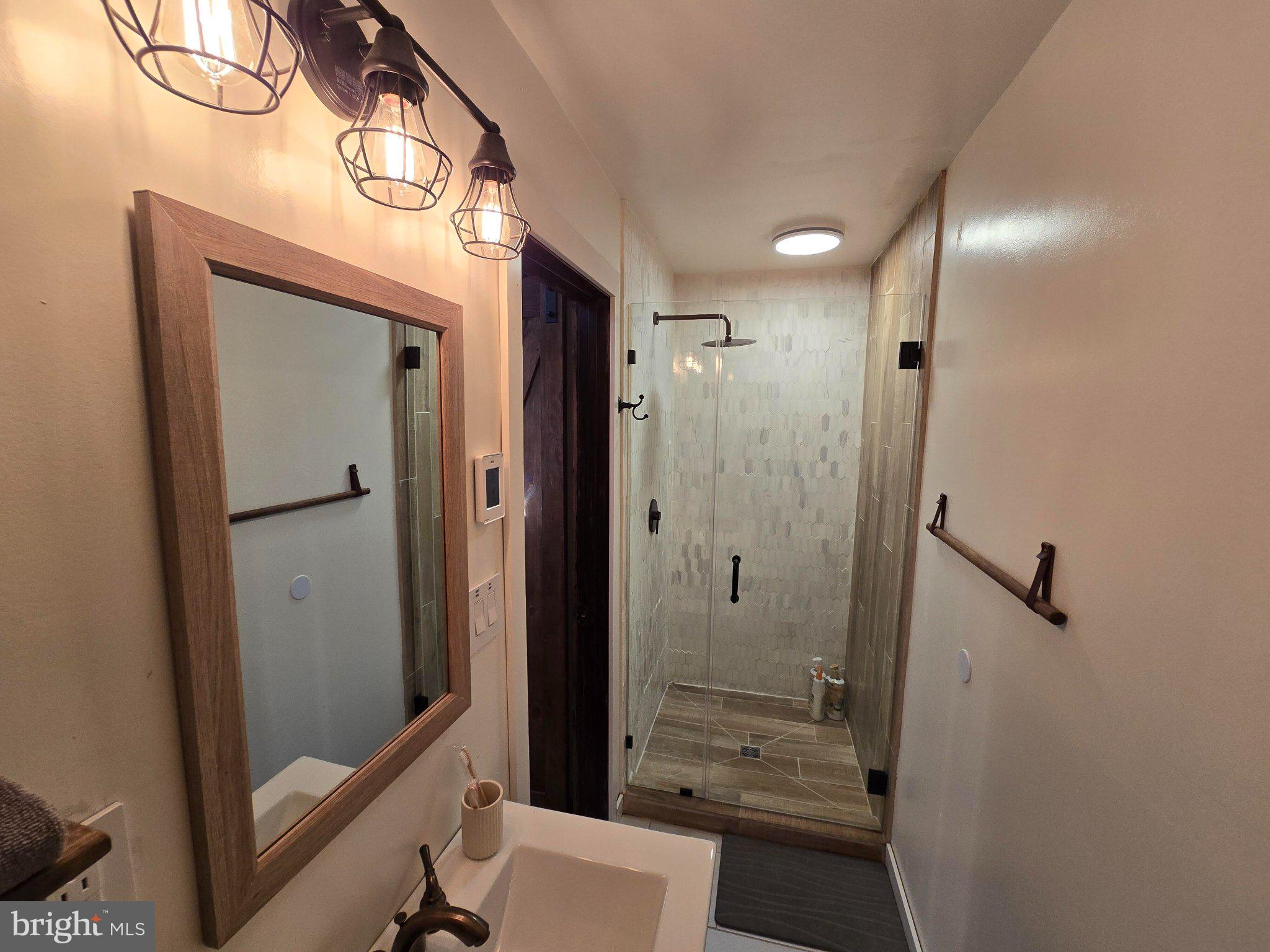 1614 High Top Road Linden, VA 22642 - Photo 14 of 25 Stylish bathroom with modern fixtures.