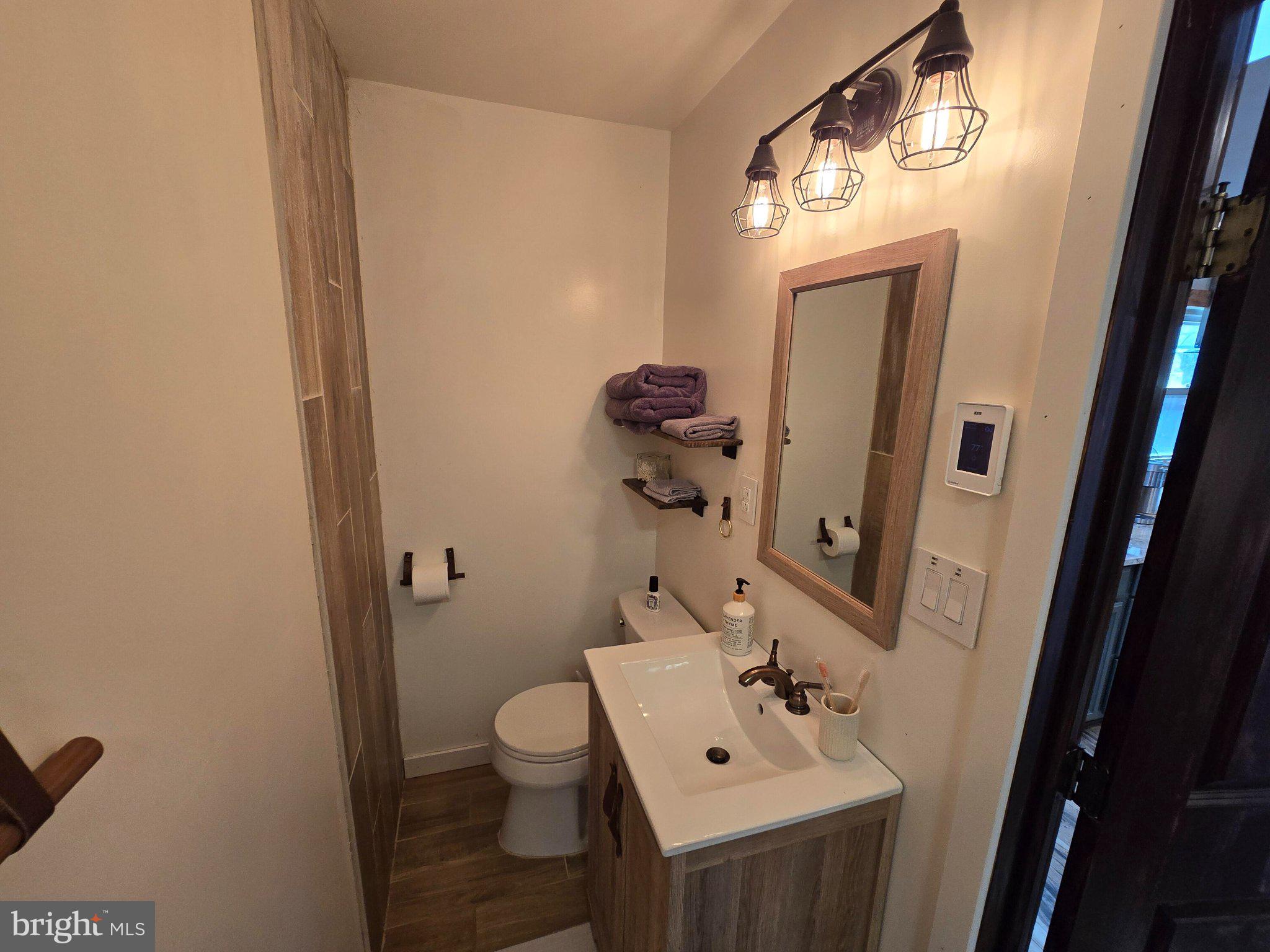 1614 High Top Road Linden, VA 22642 - Photo 16 of 25 Charming bathroom with rustic accents.