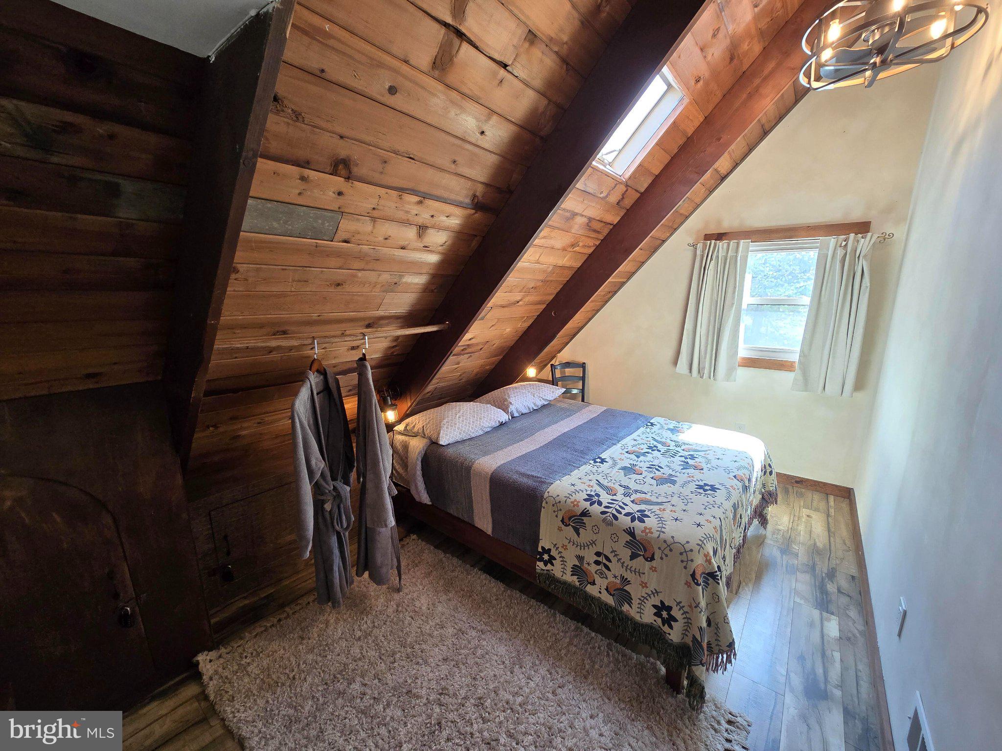 1614 High Top Road Linden, VA 22642 - Photo 17 of 25 Cozy attic retreat with rustic charm.