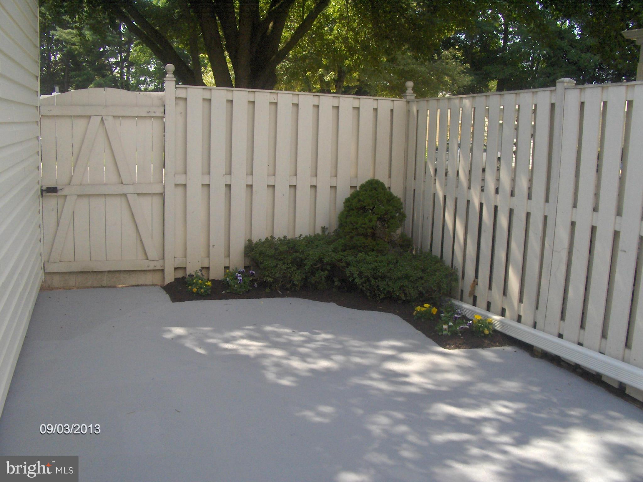 14502 Fiske Drive, Unit 138B Silver Spring, MD 20906 - Photo 14 of 21 a view of outdoor space with wooden fence