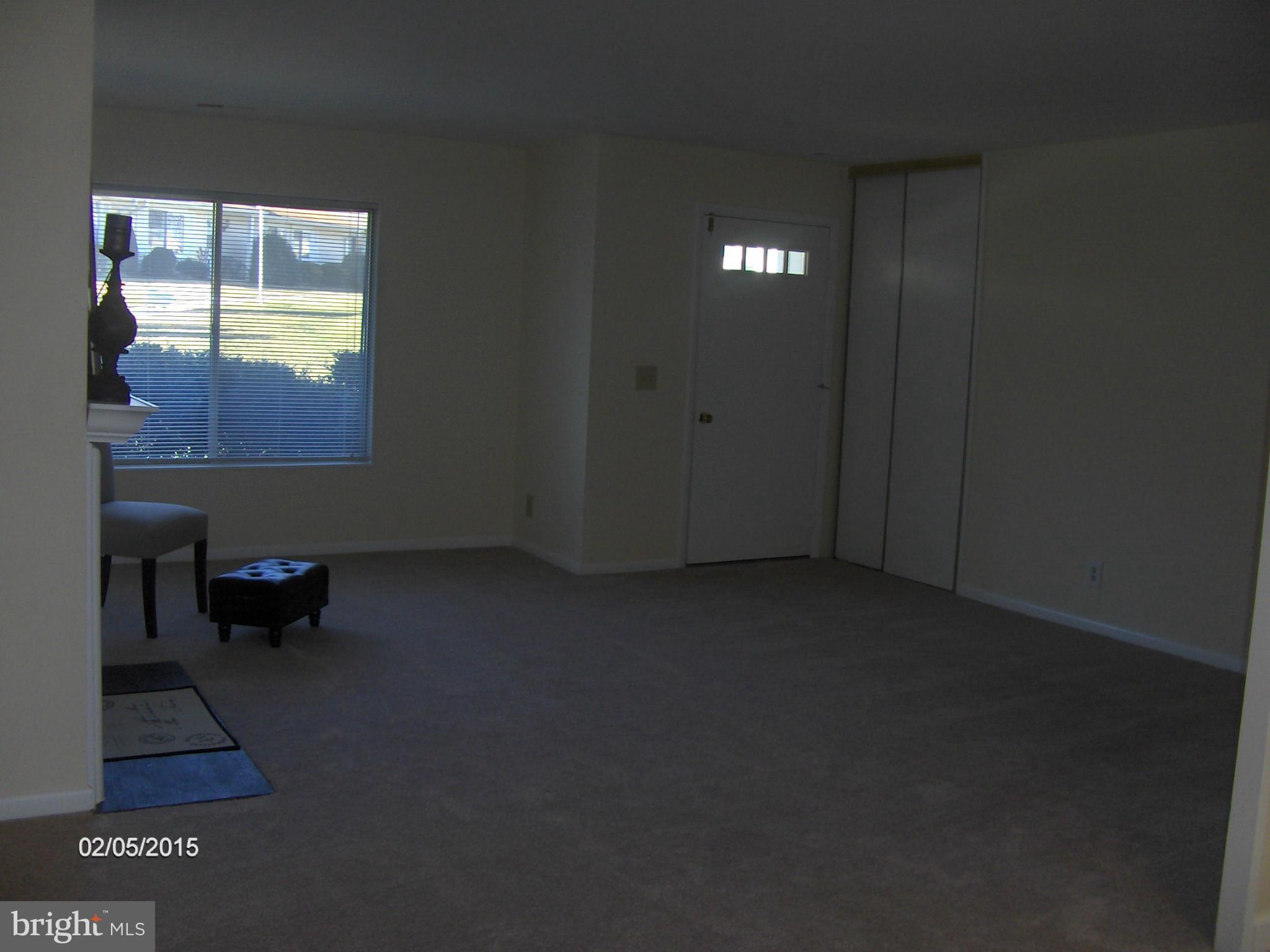 14502 Fiske Drive, Unit 138B Silver Spring, MD 20906 - Photo 5 of 21 a view of an empty room and window
