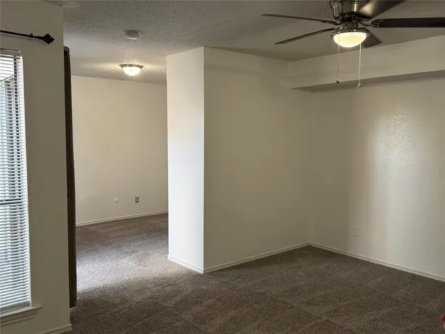 an empty room with a bathroom