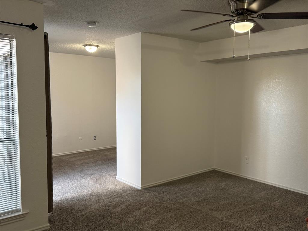 9803 Walnut Street, Unit 308 Dallas, TX 75243 - Photo 15 of 22 an empty room with a bathroom