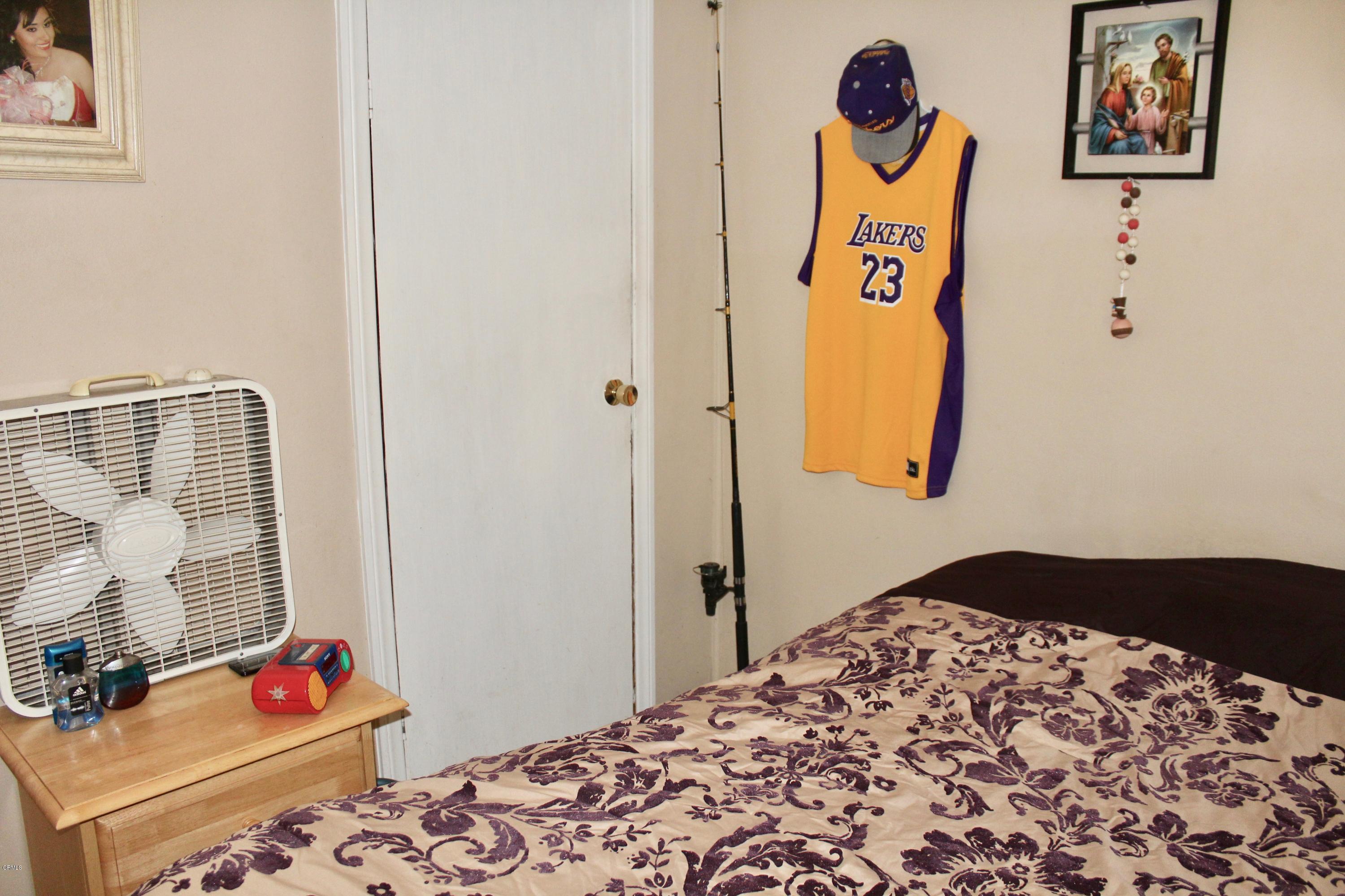 4145 Serena Lane, Unit 21 Oxnard, CA 93033 - Photo 13 of 16 a bedroom with a bed and a window