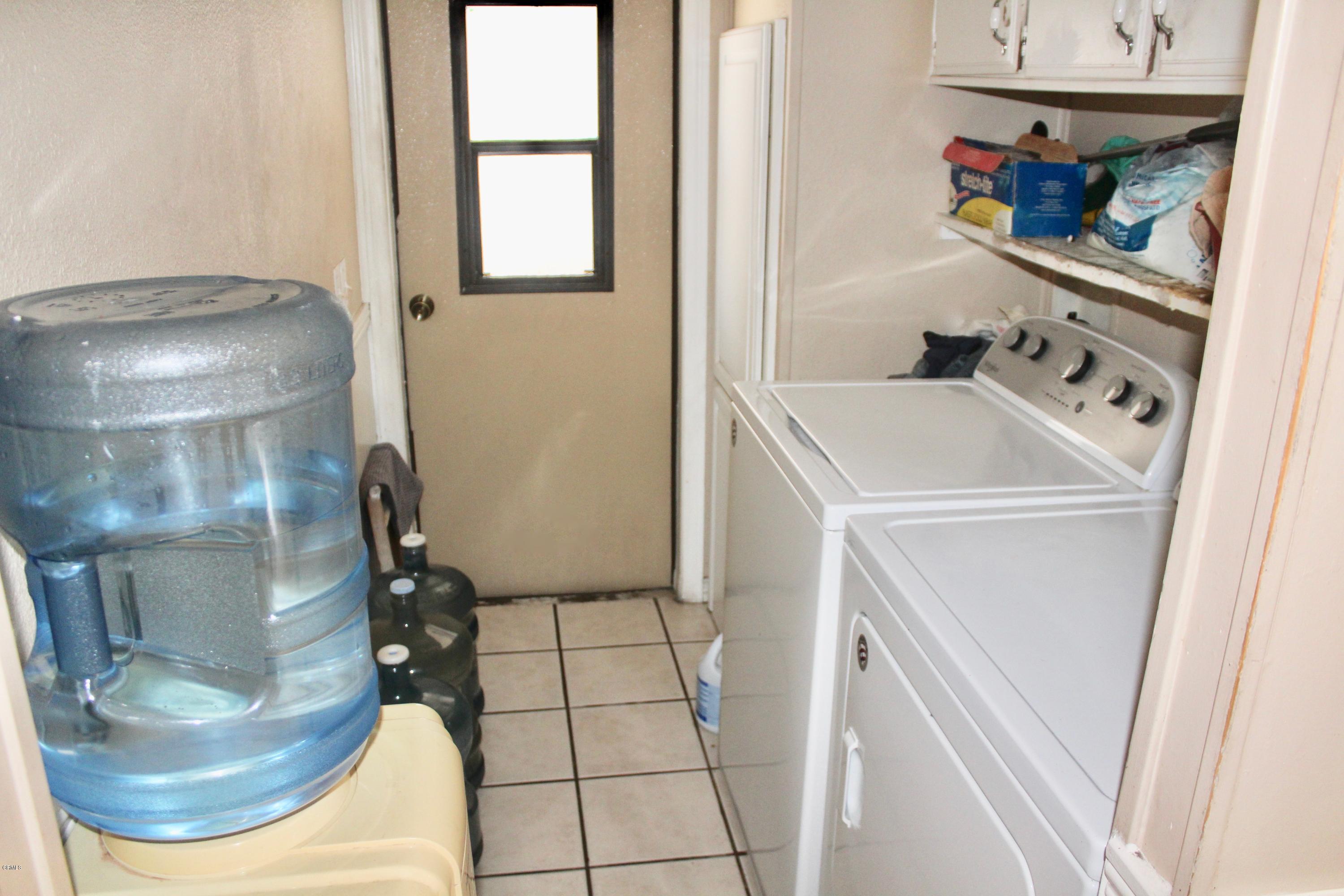 4145 Serena Lane, Unit 21 Oxnard, CA 93033 - Photo 14 of 16 a utility room with a washer and dryer