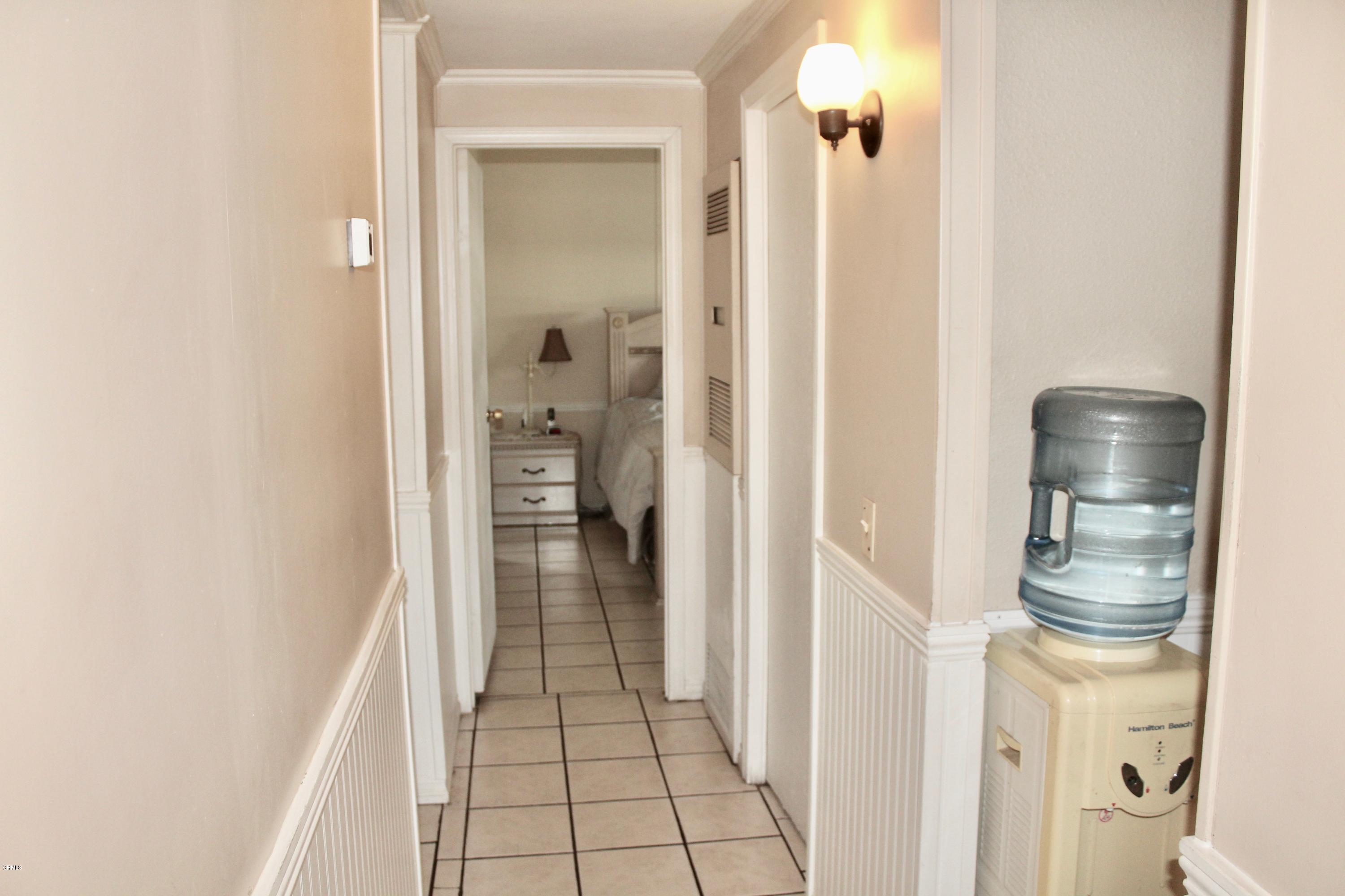 4145 Serena Lane, Unit 21 Oxnard, CA 93033 - Photo 6 of 16 a bathroom with a sink and a mirror