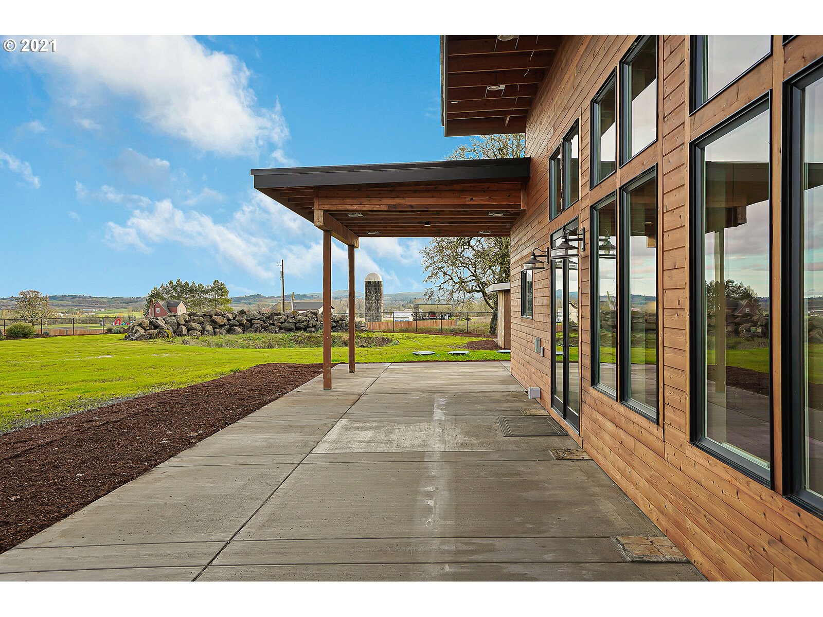 22280 Pittman Road Sheridan, OR 97378 - Photo 24 of 32 a view of a swimming pool with an outdoor seating