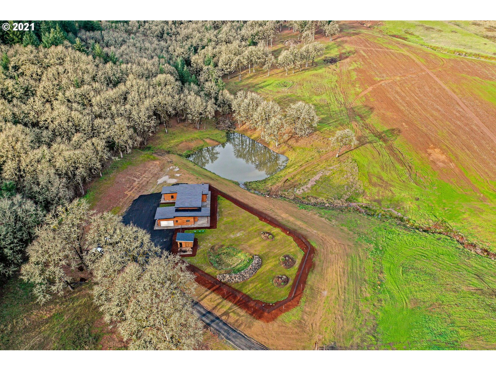 22280 Pittman Road Sheridan, OR 97378 - Photo 27 of 32 a view of a lake from a balcony