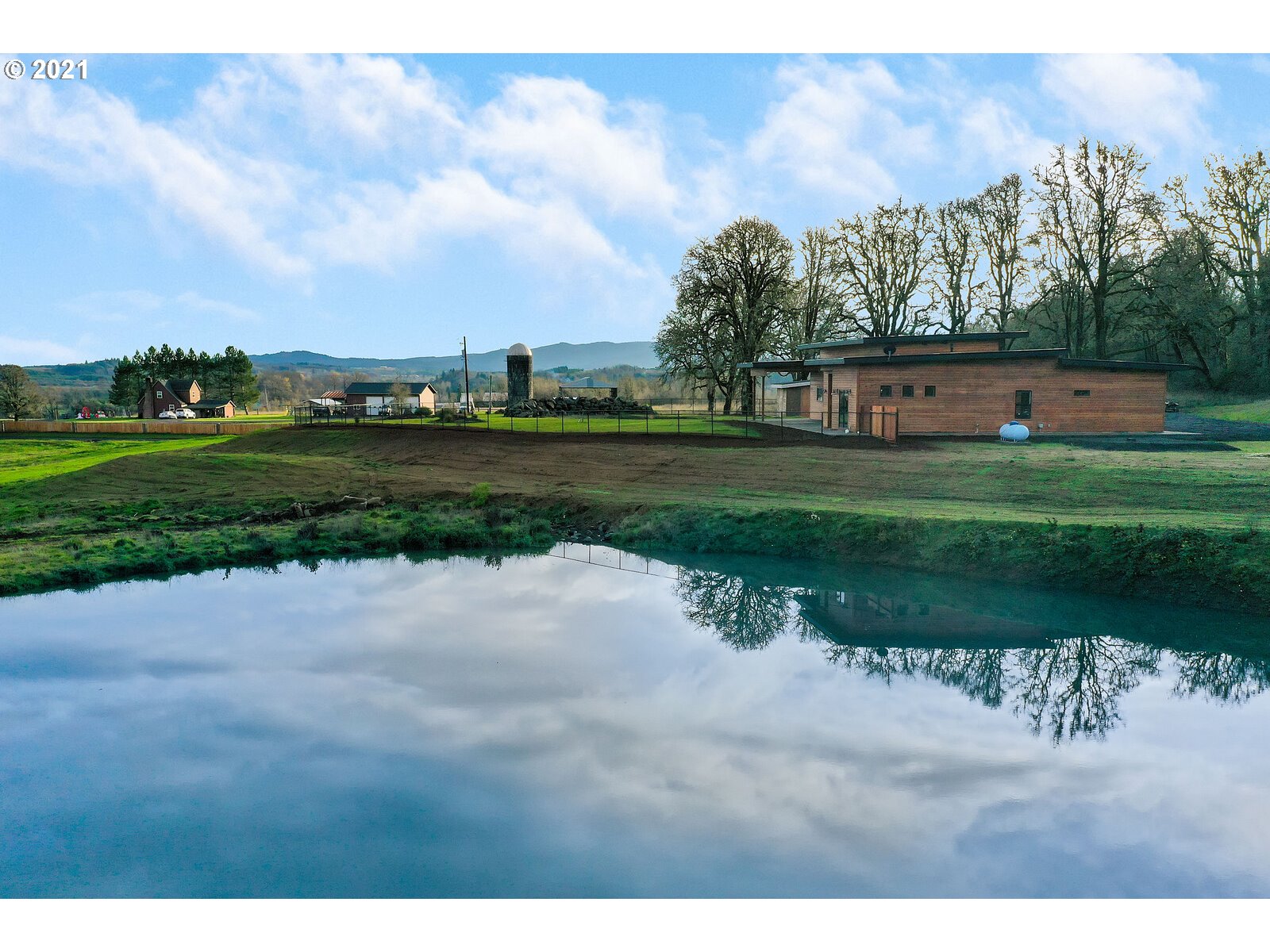 22280 Pittman Road Sheridan, OR 97378 - Photo 29 of 32 a view of a garden and basketball court