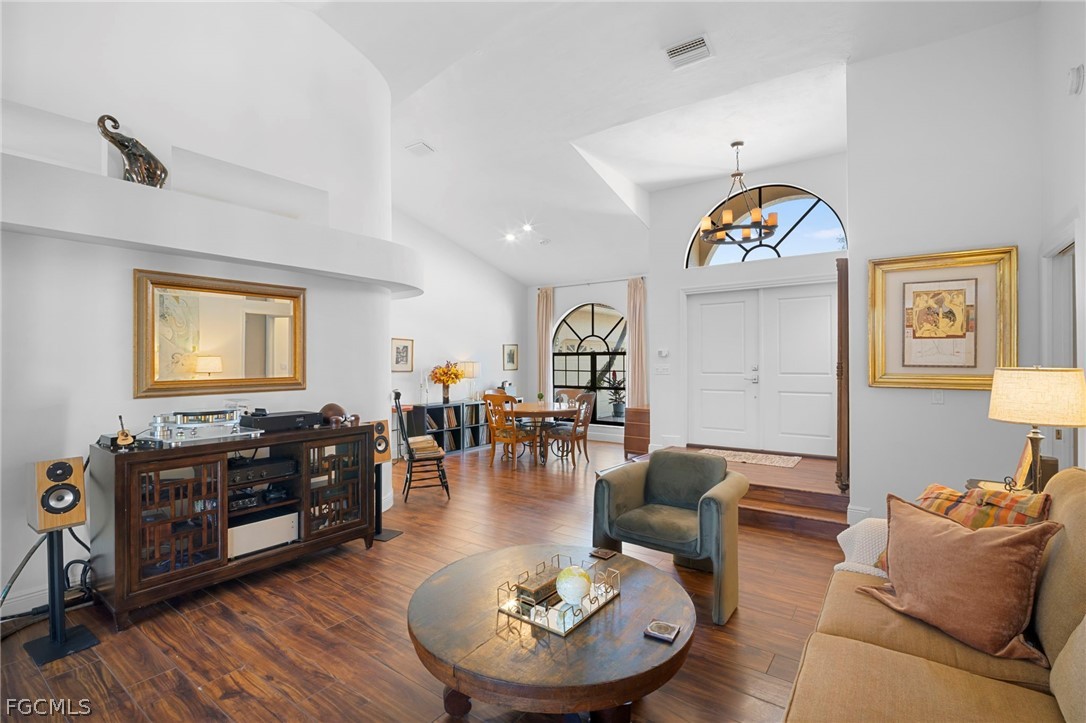 11772 Mahogany Run Fort Myers, FL 33913 - Photo 12 of 50 a living room with furniture and a wooden floor