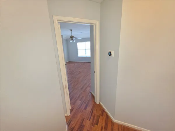 a view of hallway with stairs