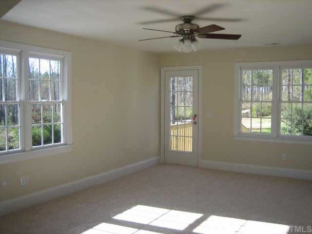 5479 Pearces Road Louisburg, NC 27549 - Photo 8 of 10 The bonus or 4th bdrm. Walk in closets and seperate entrance, hum college kids or teenagers perhaps?