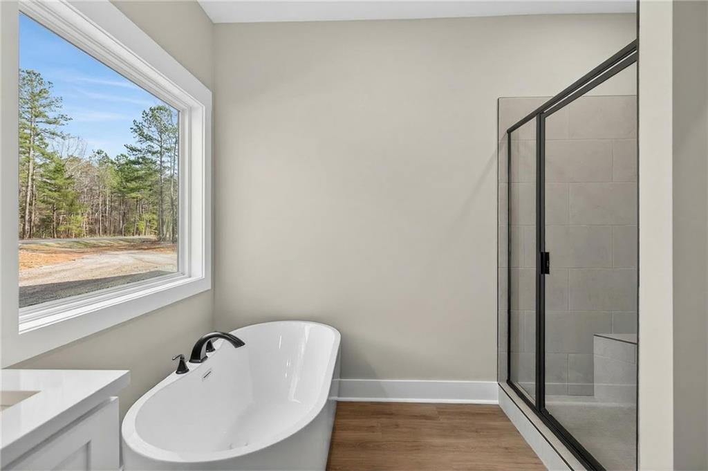 423 Relay Road Silver Creek, GA 30173 - Photo 28 of 48 a bathroom with a sink and a mirror