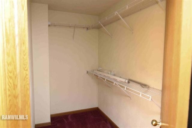 6680 North Point Road Rockford, IL 61108 - Photo 9 of 12 a view of a room with racks on the wall