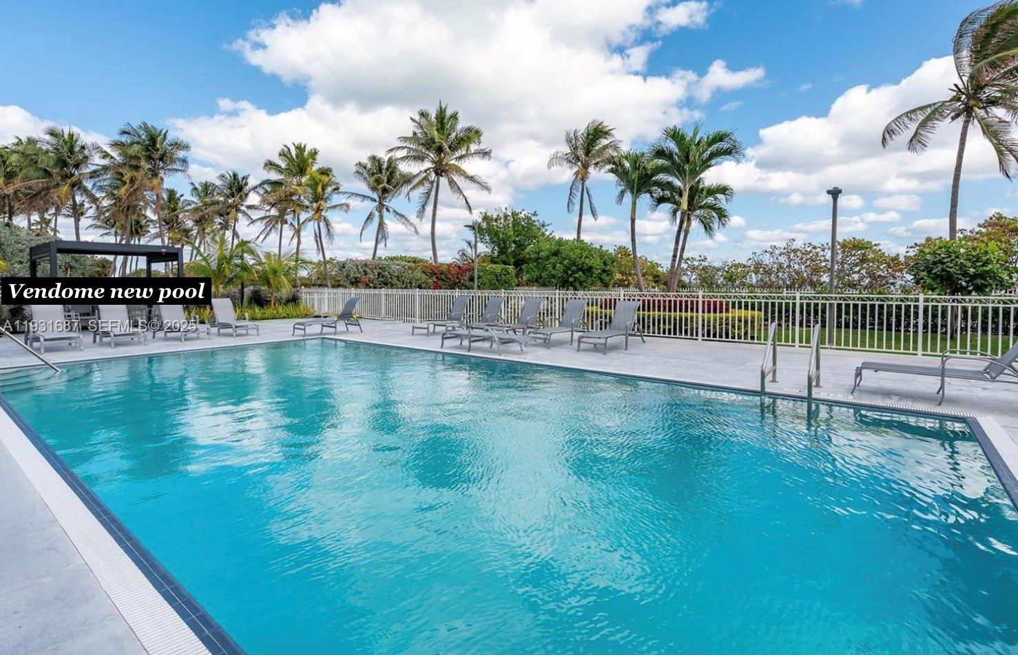 4301 Collins Avenue, Unit 803 Miami Beach, FL 33140 - Photo 15 of 25 a view of swimming pool with lake view and lake view