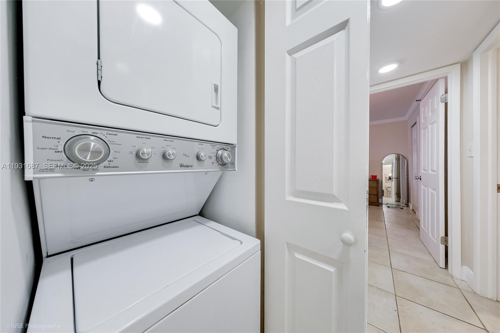4301 Collins Avenue, Unit 803 Miami Beach, FL 33140 - Photo 18 of 25 a utility room with dryer and washer