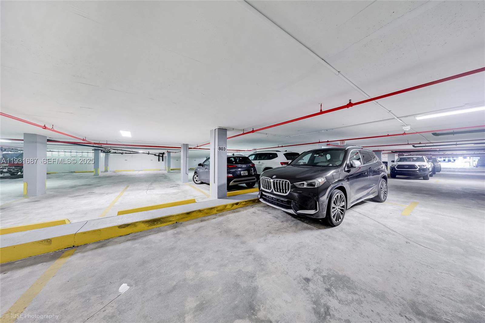 4301 Collins Avenue, Unit 803 Miami Beach, FL 33140 - Photo 22 of 25 a car parked in garage