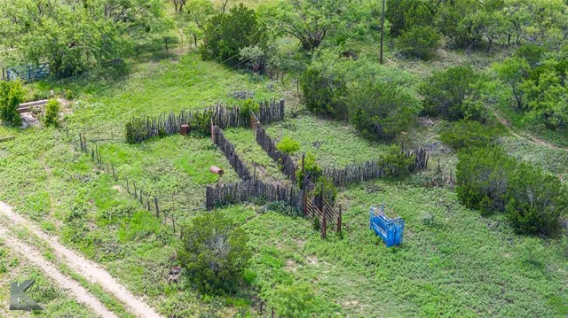 a view of a balcony with furniture