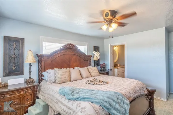 a backyard of a house with a yard and lake view