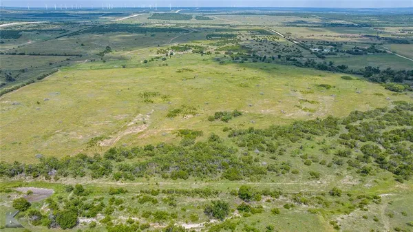 a view of an outdoor and trees