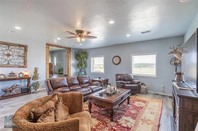 a view of a field with an outdoor space