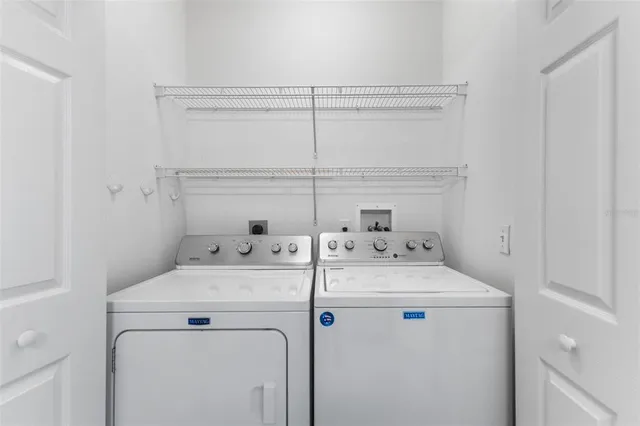 a view of a room with racks on the wall