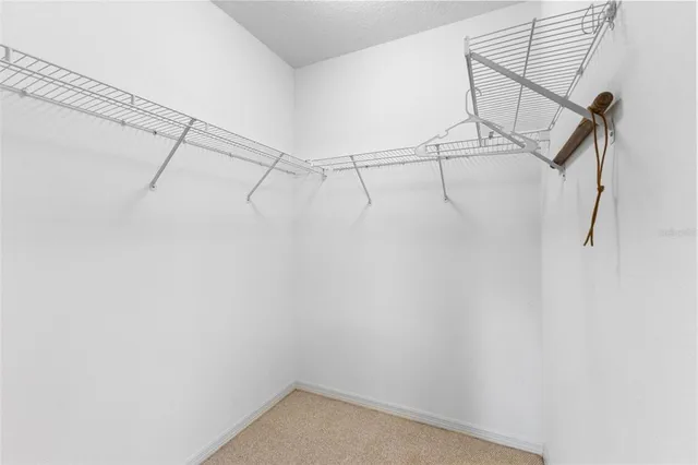 a bathroom with a shower sink and mirror