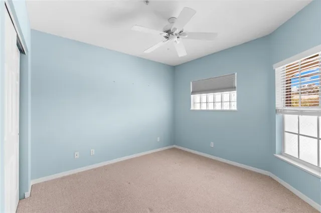 a kitchen with stainless steel appliances a stove a refrigerator and cabinets