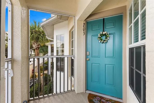 a front view of a house with garage