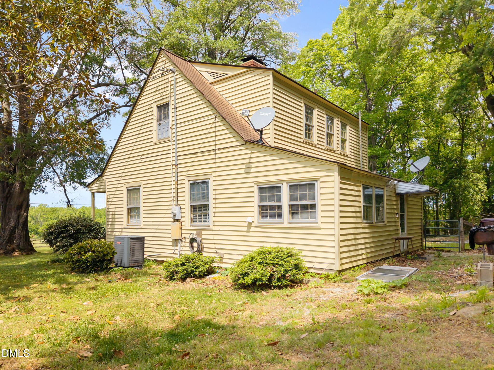 423 Quail Roost Farm Road Rougemont, NC 27572 - Photo 32 of 44 a view of a house with a yard