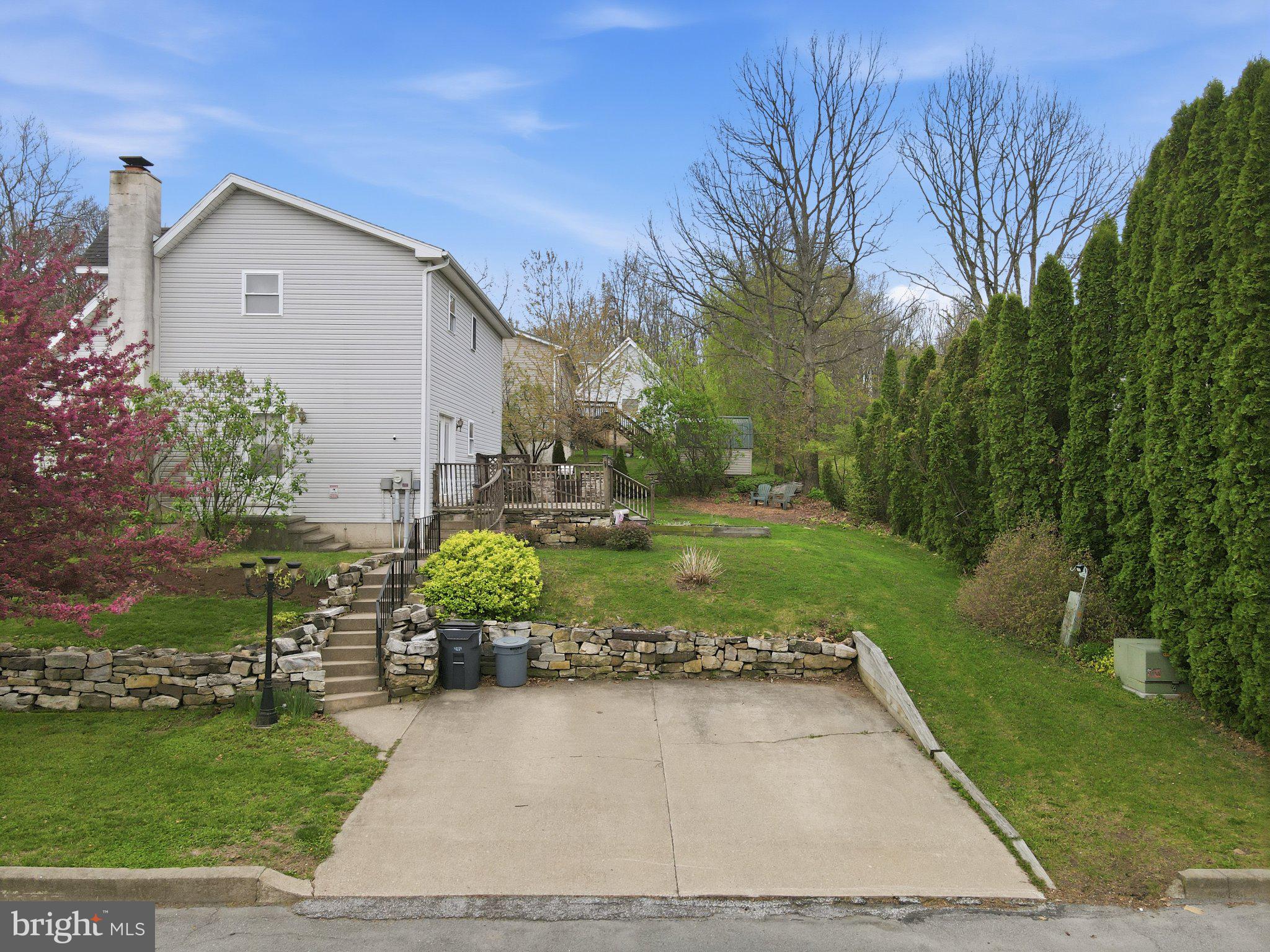 30 Freedom Street Hazleton, PA 18202 - Photo 3 of 84 Charming home with lush greenery.