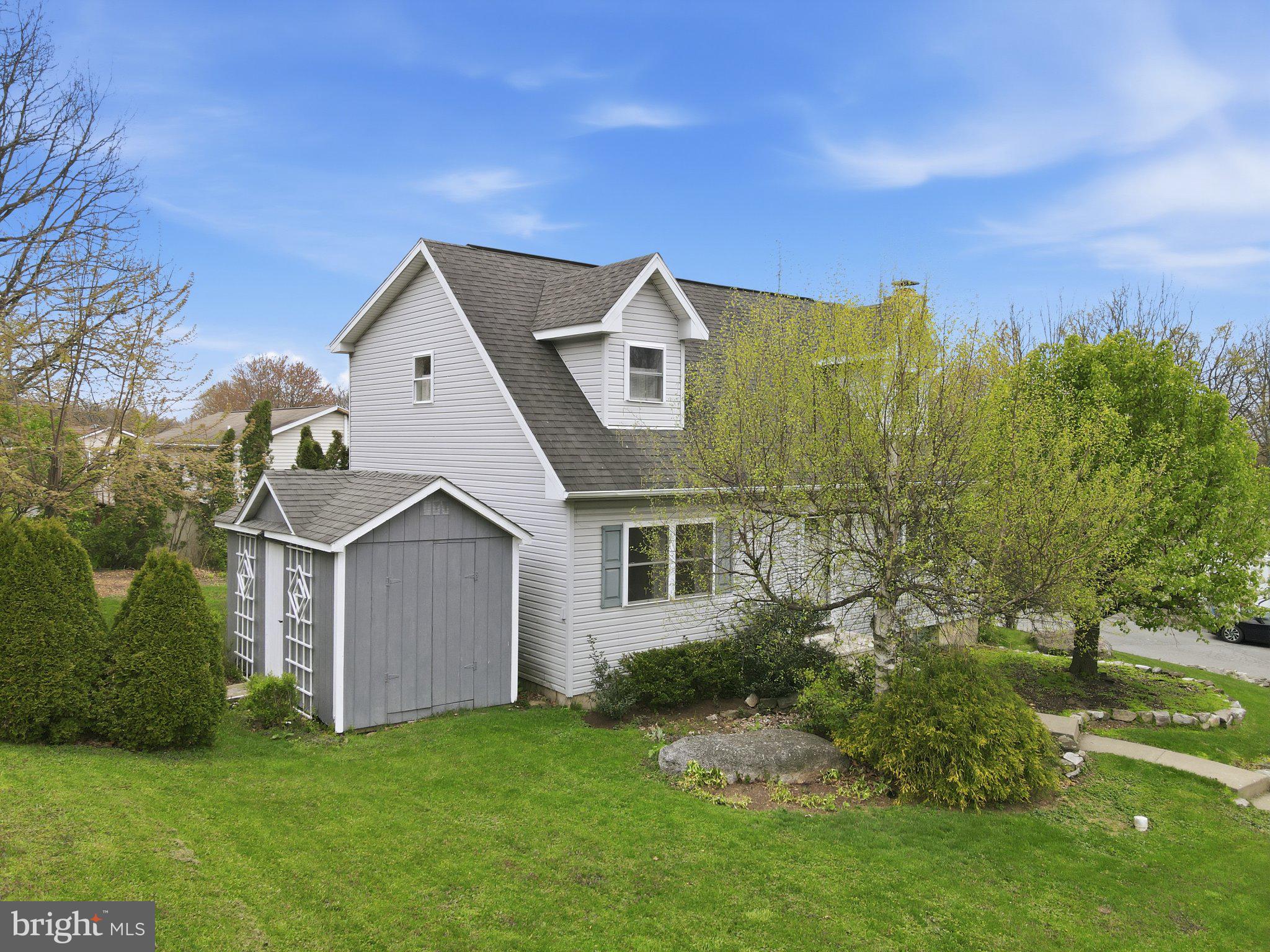 30 Freedom Street Hazleton, PA 18202 - Photo 4 of 84 Charming home with lush greenery.