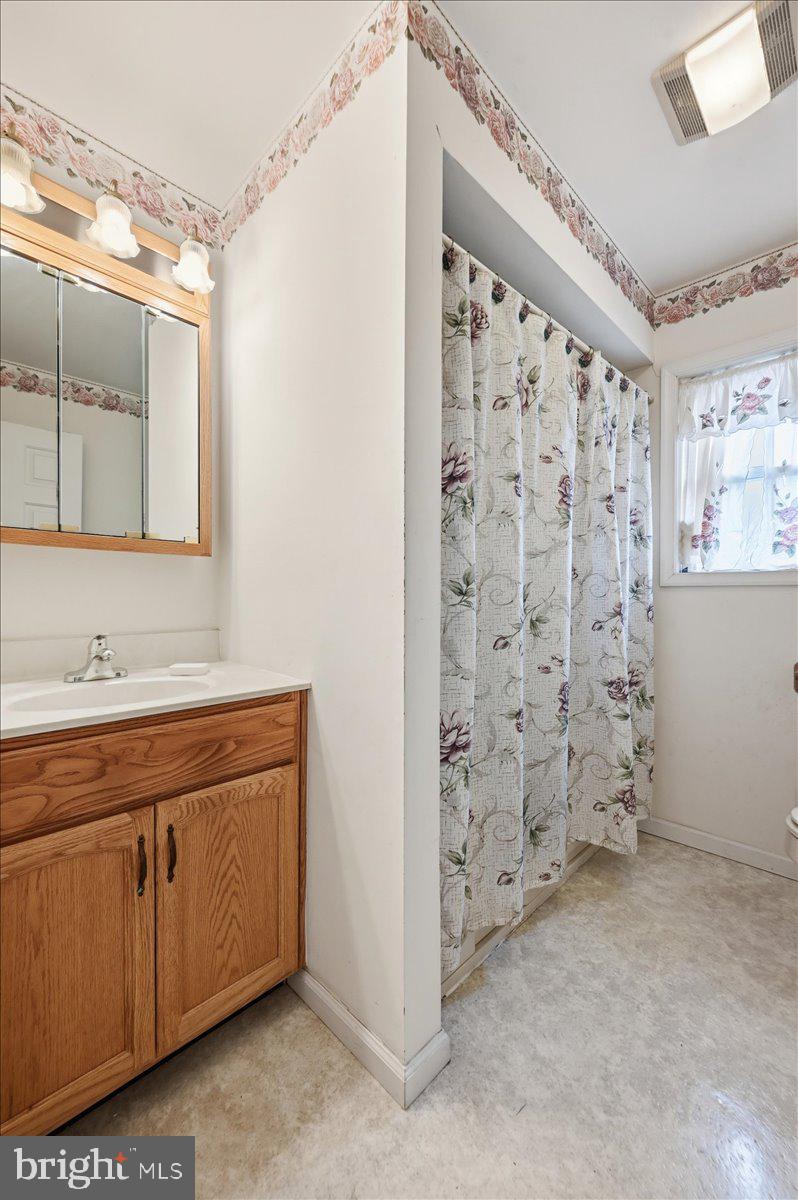 30 Freedom Street Hazleton, PA 18202 - Photo 45 of 84 Charming bathroom with floral accents.