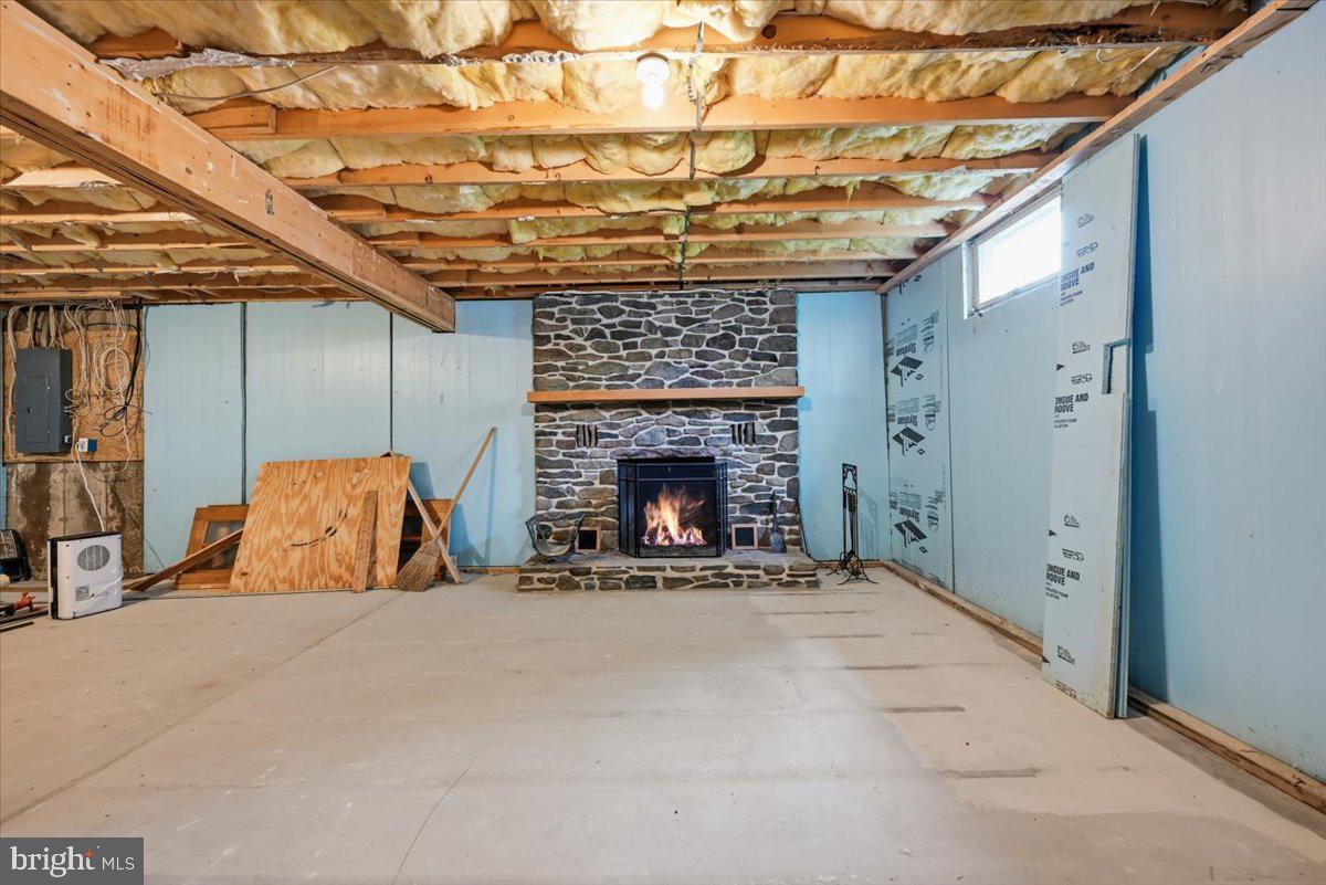 30 Freedom Street Hazleton, PA 18202 - Photo 49 of 84 Cozy basement with a charming fireplace.