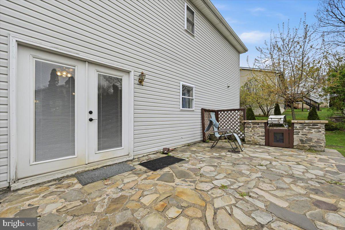 30 Freedom Street Hazleton, PA 18202 - Photo 56 of 84 Charming stone patio for outdoor living.