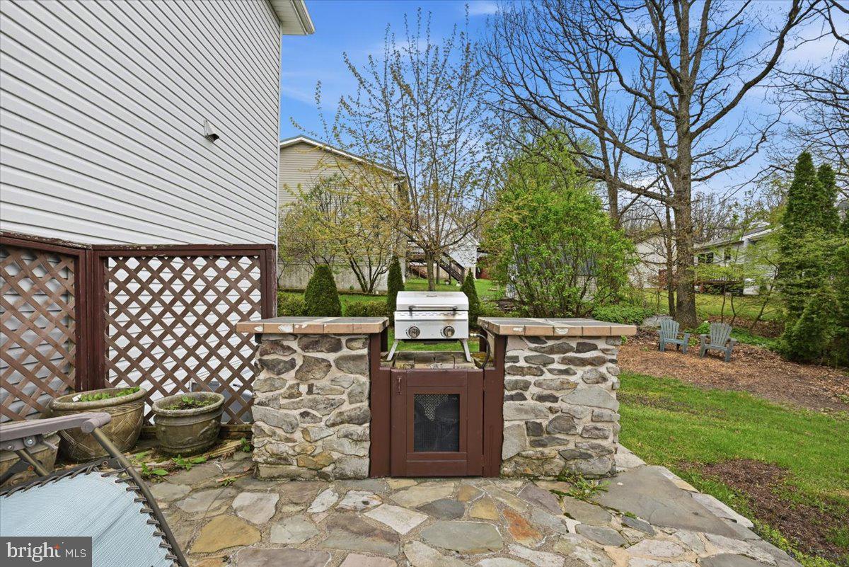 30 Freedom Street Hazleton, PA 18202 - Photo 58 of 84 Charming outdoor grilling oasis.