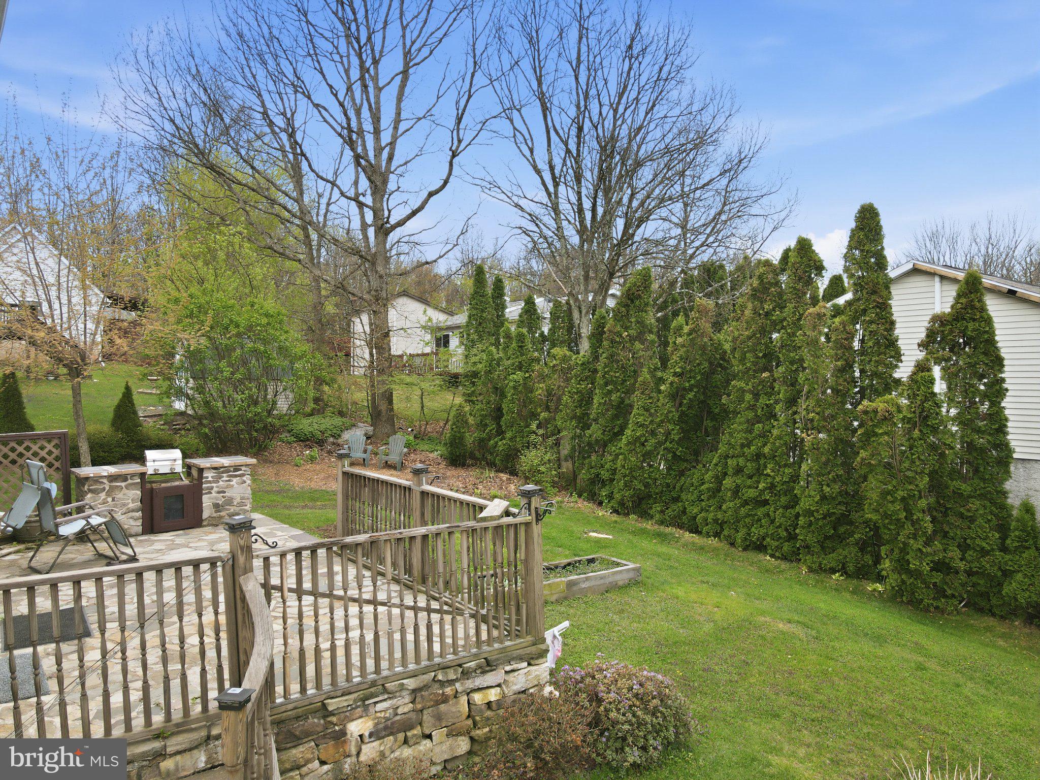 30 Freedom Street Hazleton, PA 18202 - Photo 72 of 84 Serene backyard retreat with greenery.