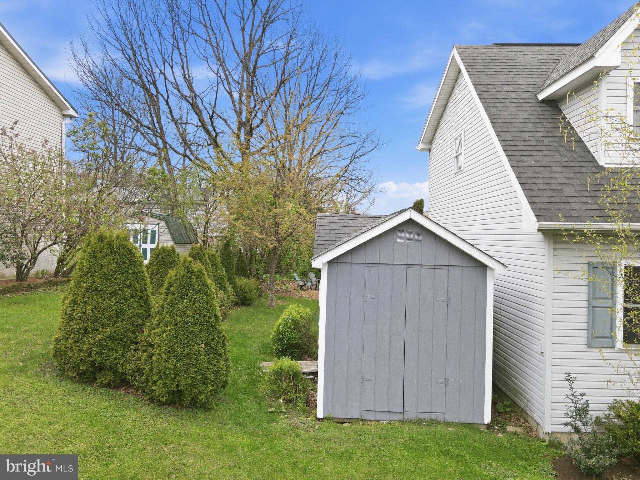 30 Freedom Street Hazleton, PA 18202 - Photo 75 of 84 Charming backyard with lush greenery.